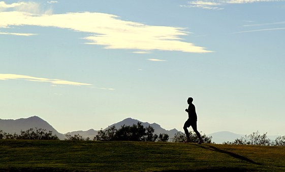 man-running-on-hill